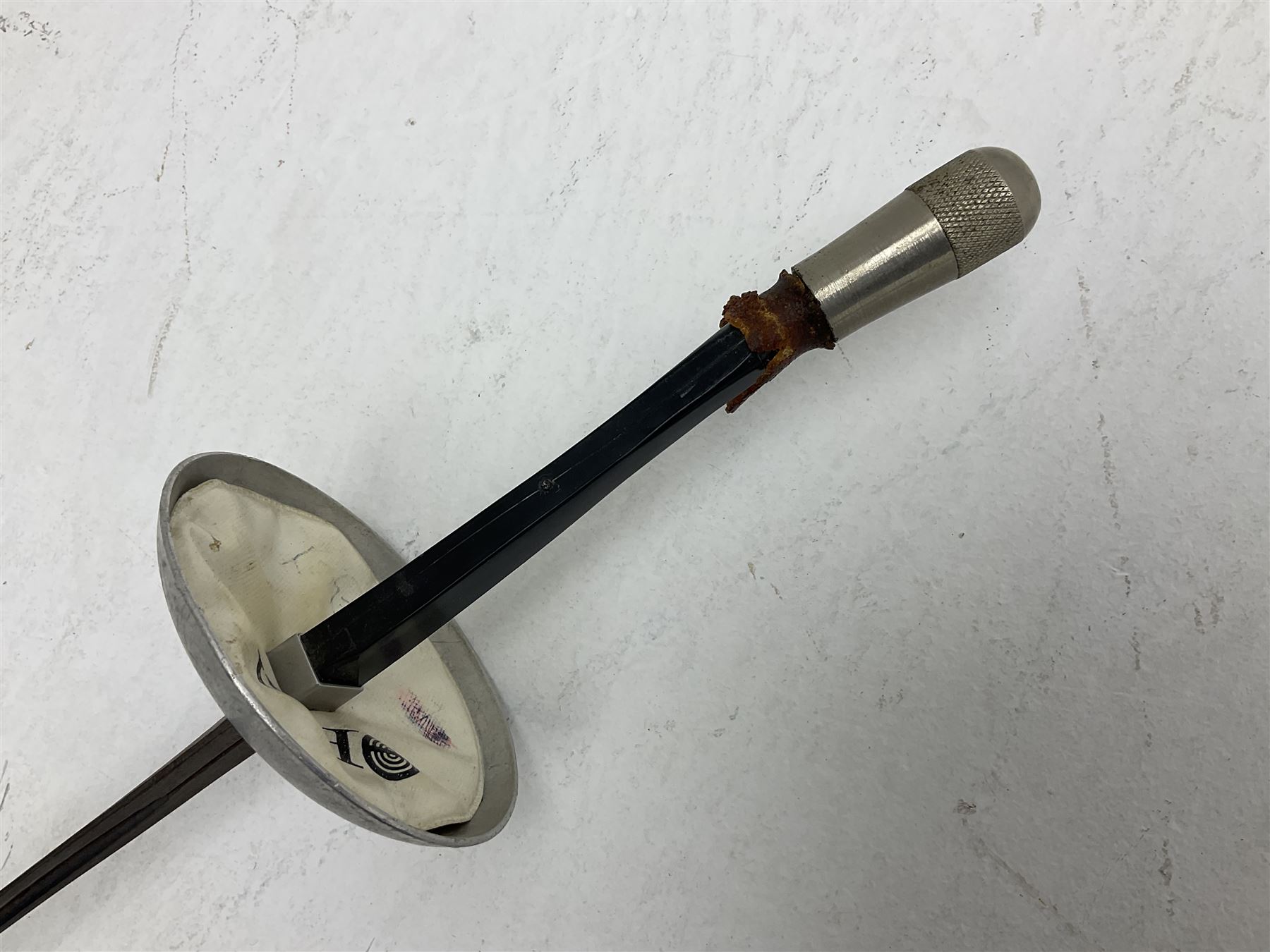 Reproduction Japanese katana with 63cm slightly curving fullered steel blade, ornate tsuba, cord bound grip and gilt transferred black saya L92cm; and two fencing foils, one marked Leon Paul (3)