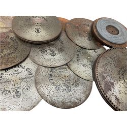 Forty-nine 27cm musical box discs, twenty-three 28cm discs and eight 39.5cm discs; together with seventeen 22cm white metal rings (no spikes)