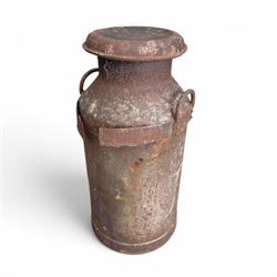 19th century milk churn with weathered patina along with aluminium watering can