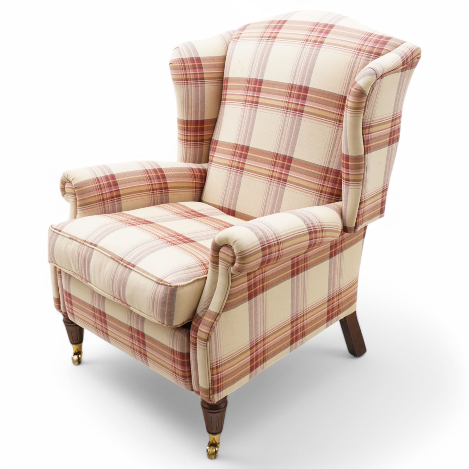 Laura Ashley - hardwood-framed wingback reclining armchair upholstered in checkered fabric, on turned and fluted front feet with brass cups and castors 