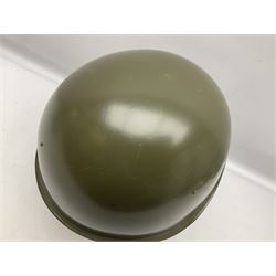 Two 1960s East Block Soviet style helmets - Czechoslovakian and Russian; both with liners (2)