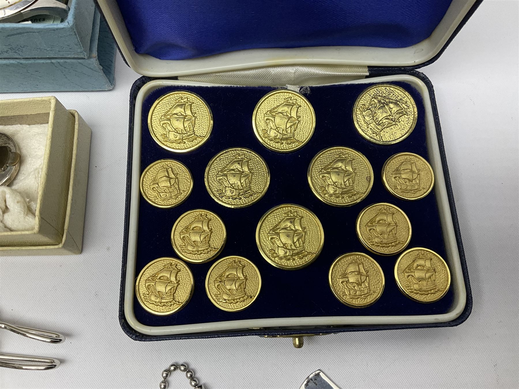 Pair of Georgian silver dress buttons, silver caddy spoon, silver fob medals, silver watches, set of six silver plated teaspoons, set of gilt buttons with ship design, etc