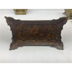 Collection of victorian and later brass desk accessories, to include a letter holder with cherub design, ink well of square form with hinged lid, brass table bell, brass casket with relief decoration, etc  