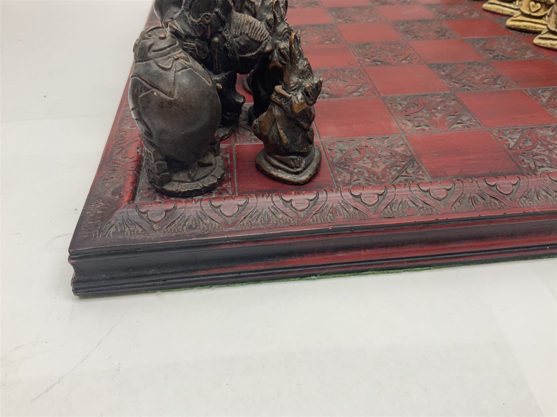 Alice in Wonderland themed chess set, with a complete set of composite figures, modelled as characters including Alice, Tweedledum and Tweedledee, the White Rabbit and the Mad Hatter, etc