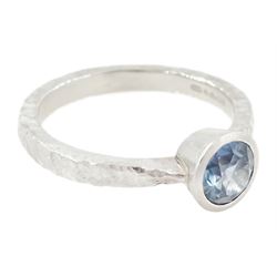 Platinum sapphire ring, single bezel set sapphire of approx 1.00 carat, to a planished shank, London 2019