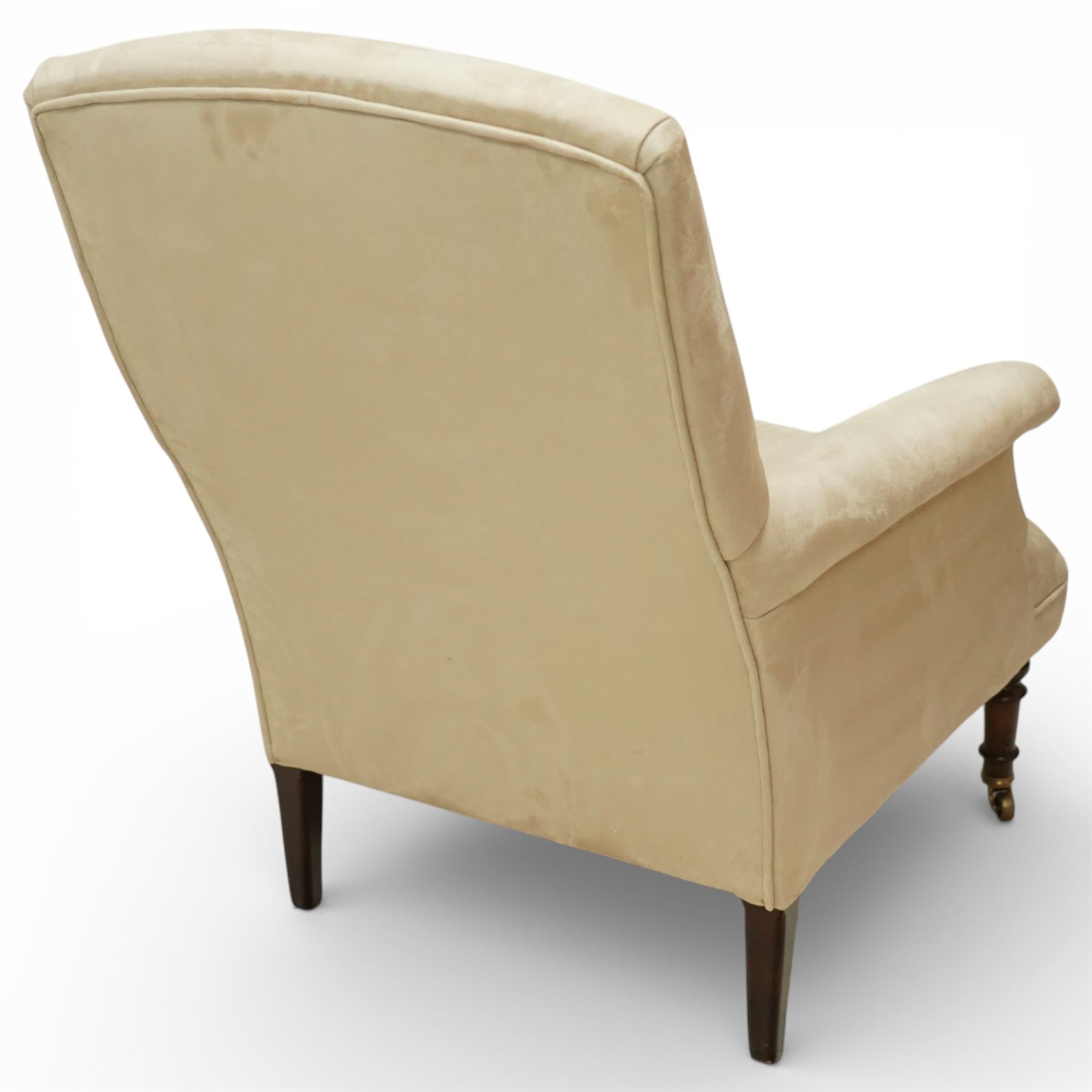 Sofas & Stuff - pair of ‘Thistle’ armchairs upholstered in neutral fabric, each with gently sloping back, padded scroll arms with close-set stud detailing, loose seat cushions, raised on turned wooden legs with brass castors