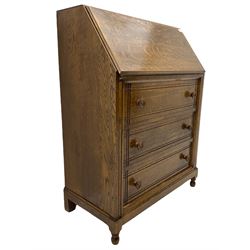 Mid 20th century oak fall front bureau, fitted with three drawers