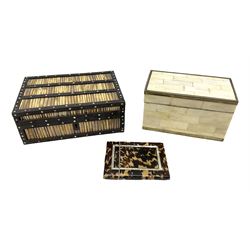 19th century tortoiseshell card case, decorated with inlaid mother of pearl bands, L10cm, together with an Anglo-Indian ebony and porcupine quill box, W19cm H7cm D13cm and another 19th century box decorated with panels of bone laid onto wood with silver-plate border mounts, H9cm W15.5cm D8cm