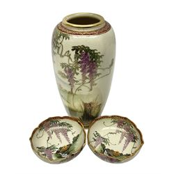  Japanese Satsuma Meiji period vase painted with a mountainous river landscape scene with wisteria and irises; together with a pair of similarly painted small dishes, signature beneath, vase H15cm