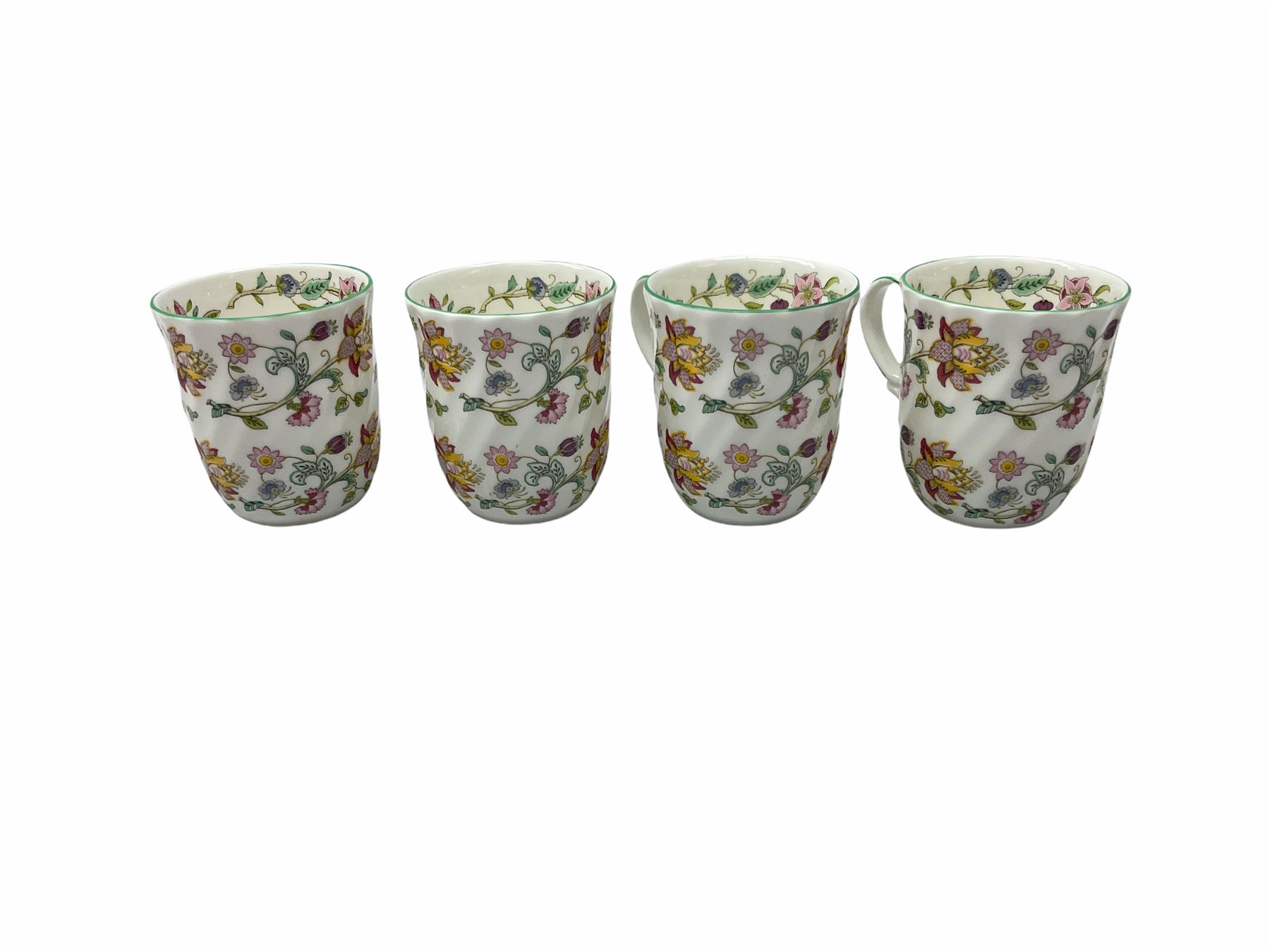 Minton Haddon Hall pattern tea and dinner wares, including basket dish, two covered tureens, six dinner plates, eight dessert plates, twelve tea plates, six soup bowls, six cereal bowls, teapot, coffee pot, milk jug, covered sucrier twelve tea cups and saucers, six mugs, footed bon bon dish, pair of candlestick holders, cake knife and slice etc (81)