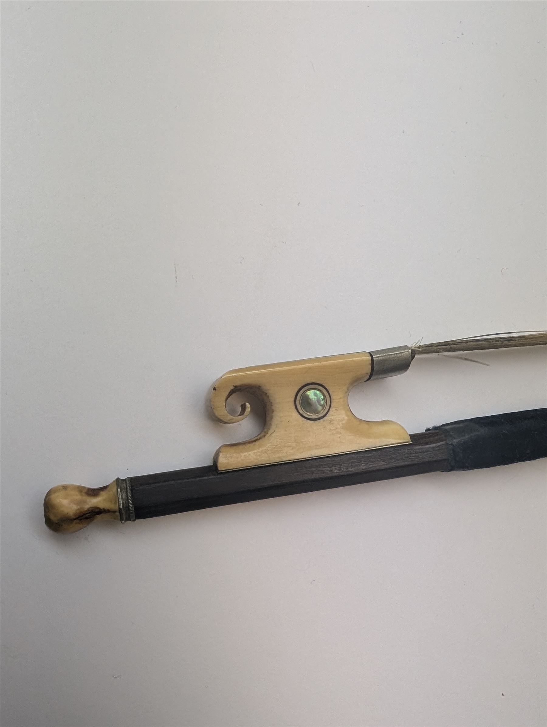 Late 19th century full size German violin with a  Wolff Brothers label, scroll with ebony pegs, finger board and tail piece, in a hard case with bow. Length 60cm

This item has been registered for sale under Section 10 of the APHA Ivory Act