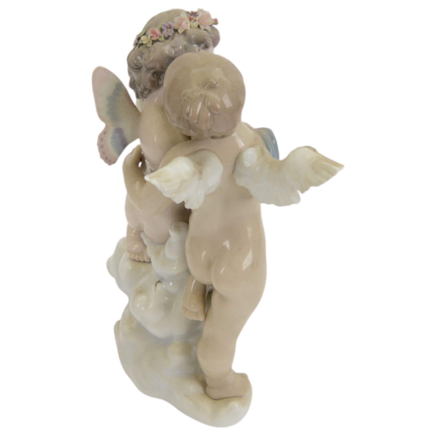 Lladro figure, Heaven and Earth, modelled as two cherubs, no 1824, with original box 