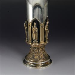 Modern limited edition silver goblet, 'made by order of the Lord Bishop of Ripon to commemorate the foundation of the Diocese in 1836', designed by Hector Miller for Aurum, the plain fluted cup, upon an ornate figural parcel gilt stem and stepped circular foot, no. 112/500, hallmarked Hector Miller, London 1985, H17cm, with certificate