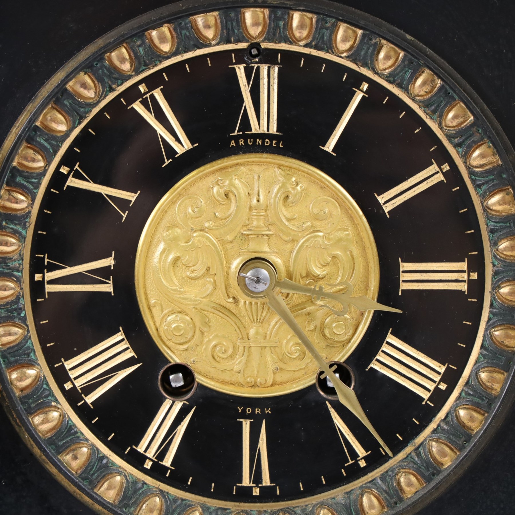 John Cundill Arundel of York eight-day marble-cased mantle clock, with black slate dial and gilt roman numerals, a shaped pediment and recessed marble pillars, H42cm