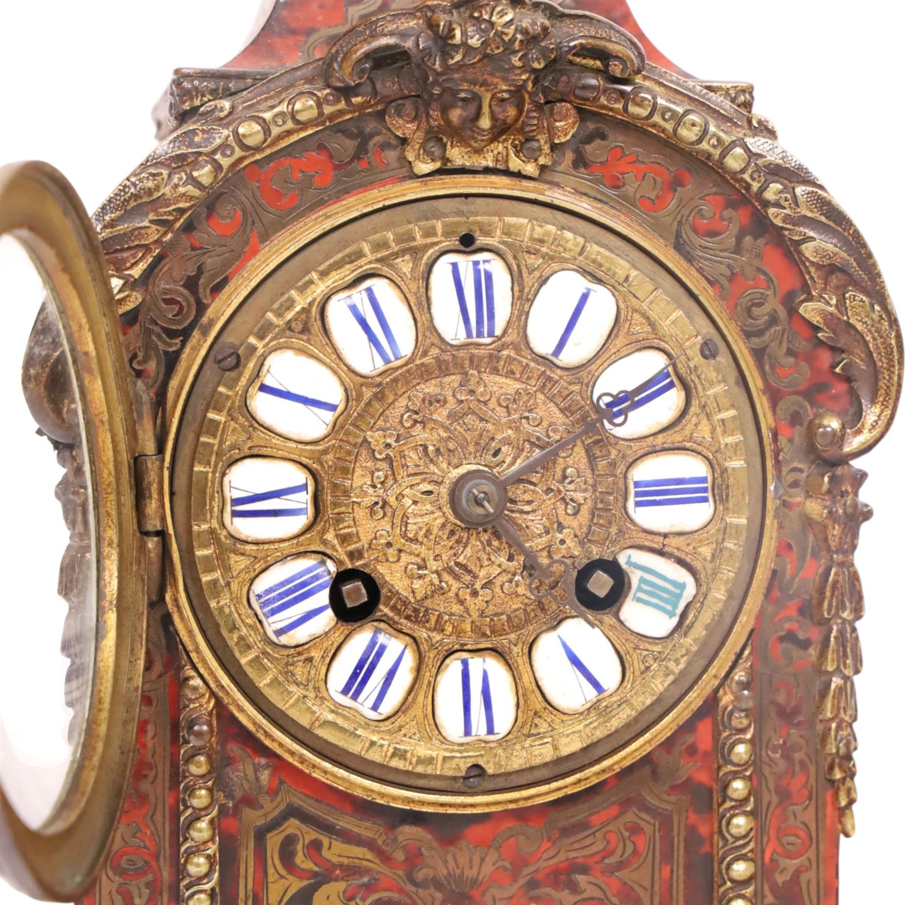 19th century,  French Boulle style mantel clock, drum movement, with a simulated scarlet tortoise shell, gilt brass dial inscribed with Roman numerals upon enamel lozenges, H30cm