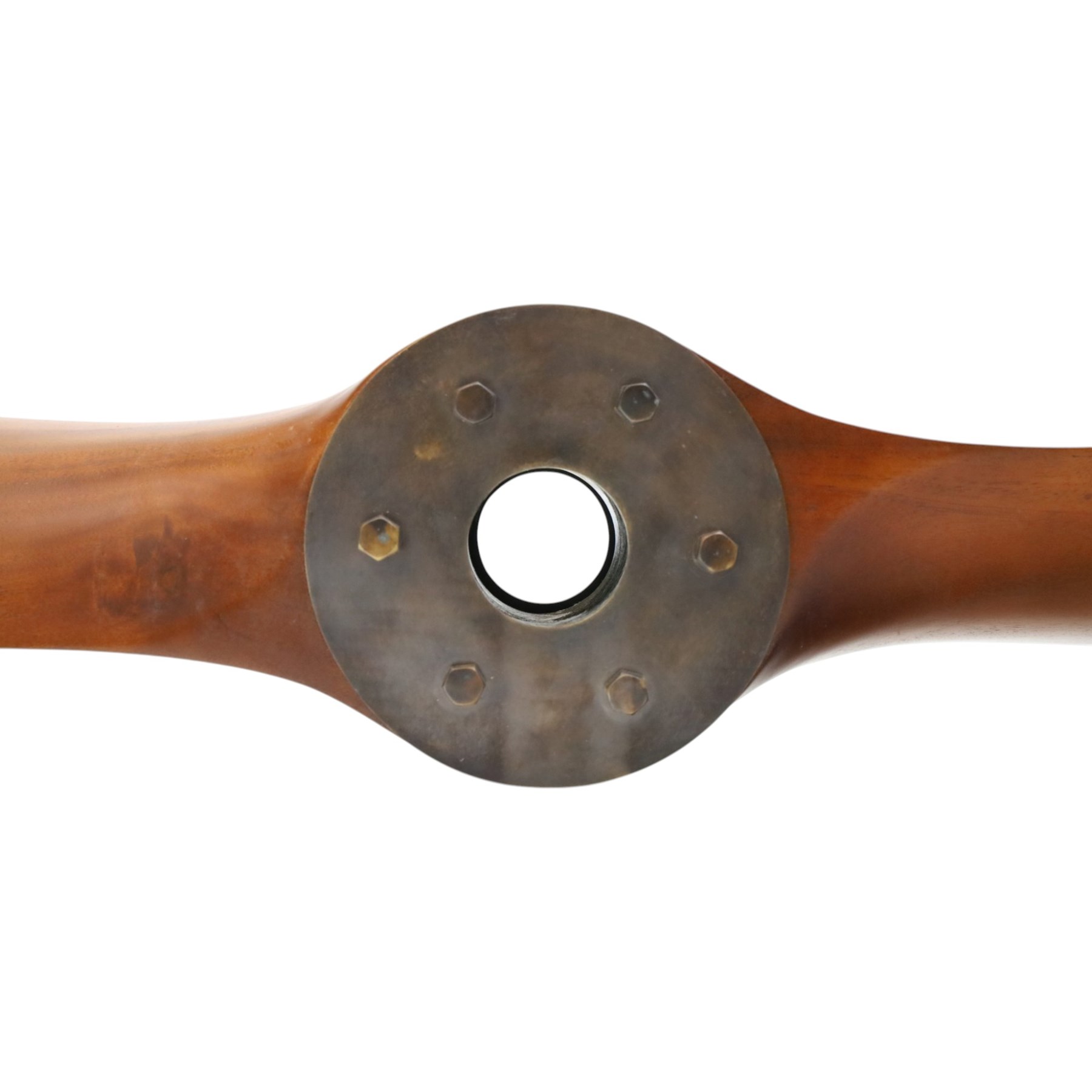Aviation design two-blade mahogany propeller, shaped blades with black painted ends, central mounting aperture within a circular six-bolt metal hub plate