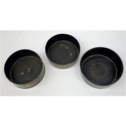Two Regency black papier-mâché wine coasters, together with a toleware example, each with gilt foliate decoration, each approximately D13cm 
Provenance: From the collection of the Cook Family.
