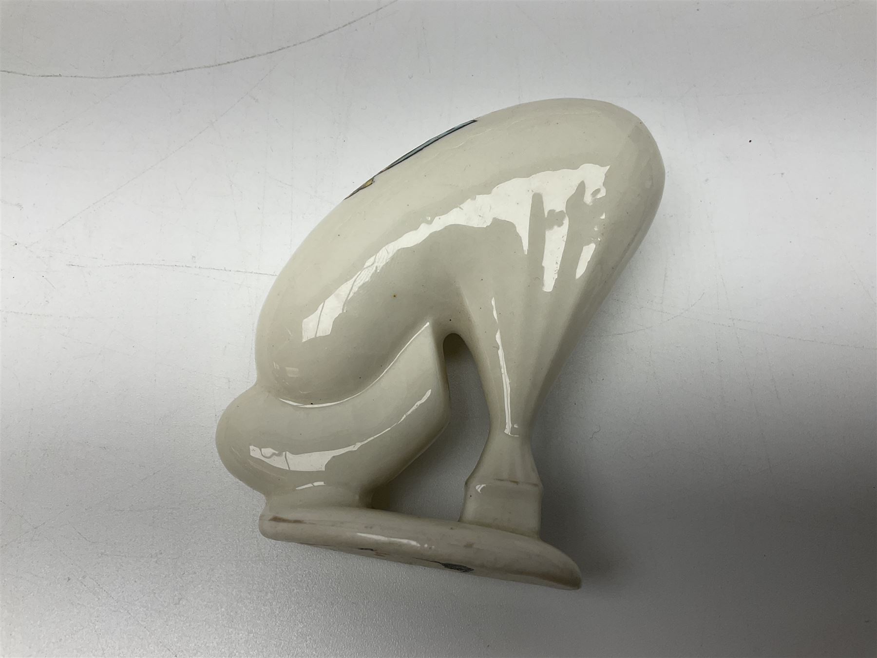 Ten WW1 crested china military models comprising submarine, four ships including Lusitania, four Zeppelins/balloons and an aircraft; various makers including Arcadian China, Swan China, Carlton China, Waterfall, Grafton China etc; various crests including Saint Neots, Great Yarmouth, Tewksbury, Swanage, Simons Town, Hull etc (10)