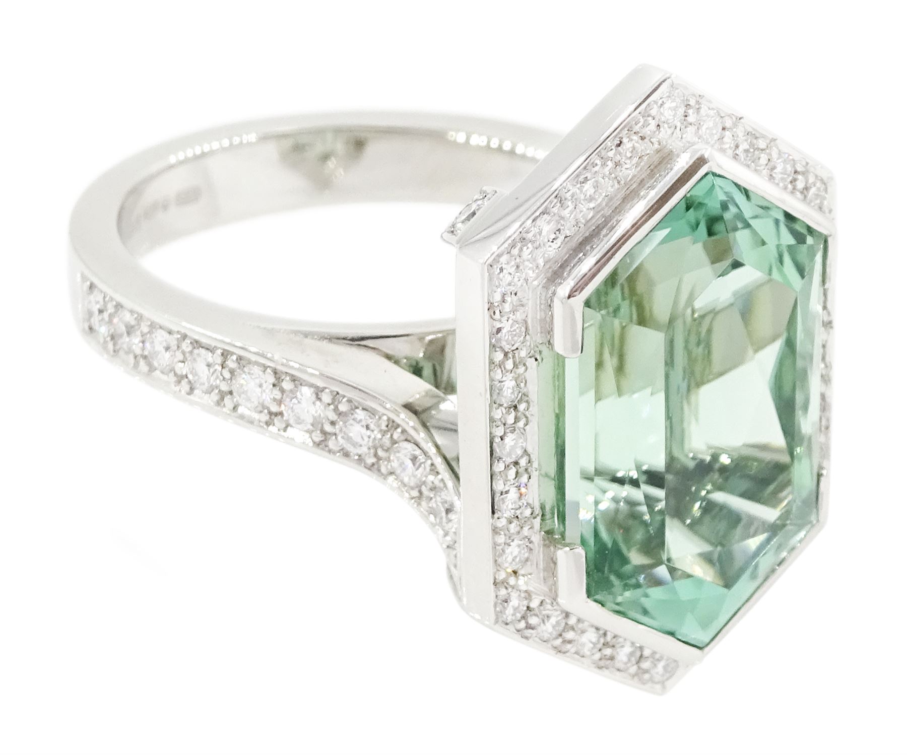 Platinum African Paraiba tourmaline and diamond ring by Scarab London, single fancy double bullet cut tourmaline of approx 8.37 carat, with round brilliant cut diamond surround and diamond set shoulders, London 2023, total diamond weight approx 1.05 carat, with Alan Poultney Gems report