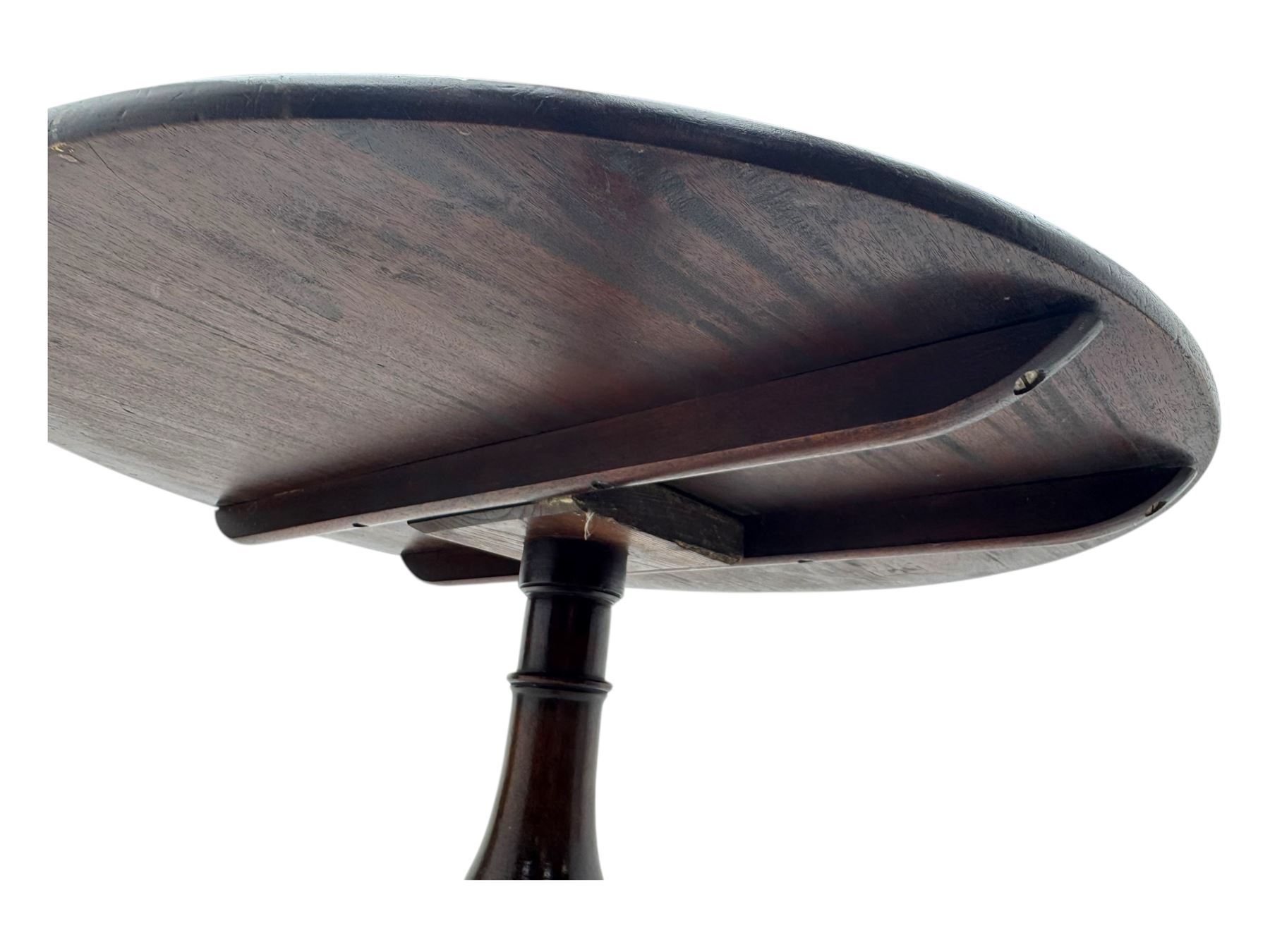 19th century mahogany tilt-top occasional table, circular top on a turned baluster column, raised on three splayed supports