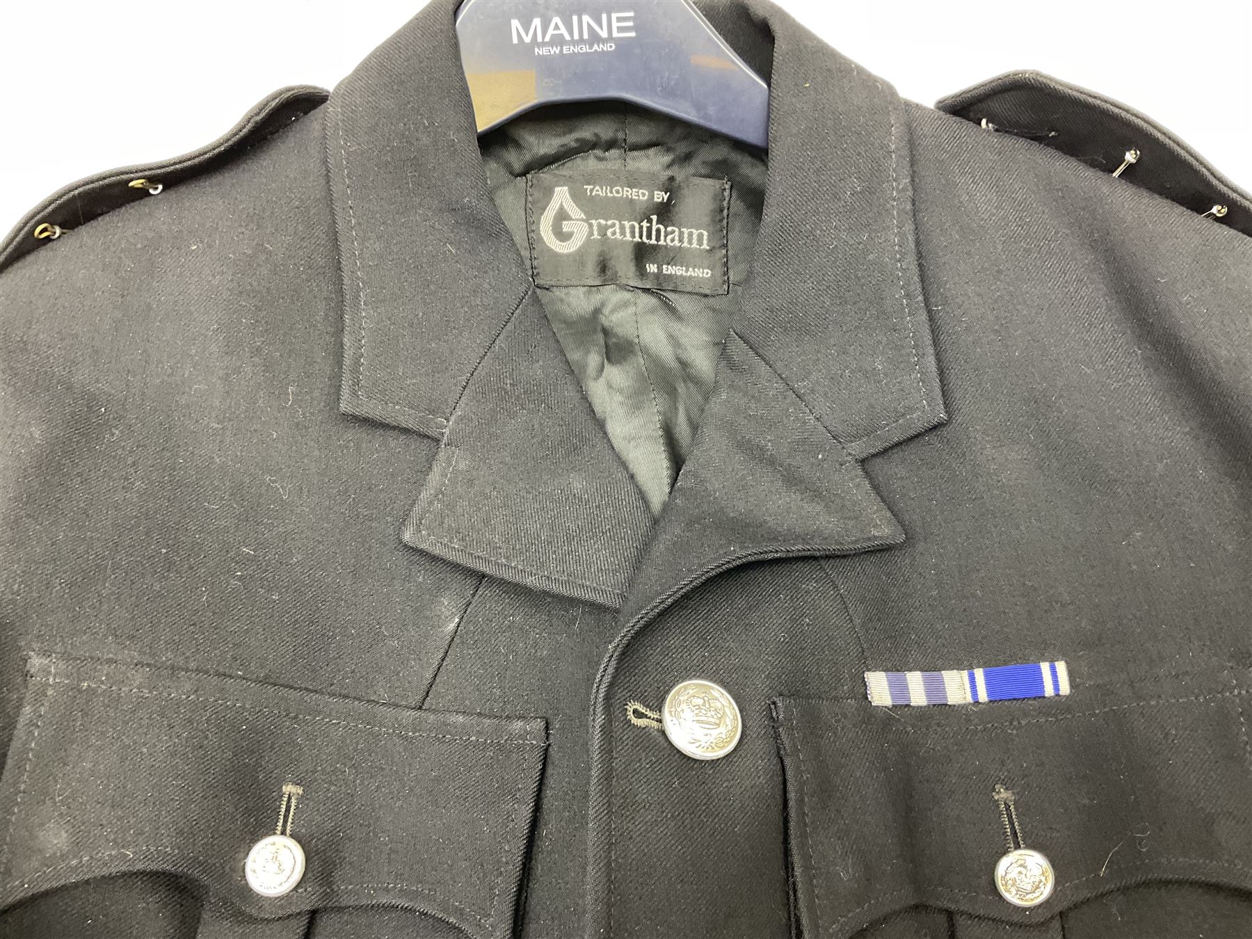 LNER Police cape; indistinctly dated 1943(?); York & North East Yorkshire Police belted tunic; belted tunic with Chief Constable epaulettes and buttons; and another tunic with staybrite Queens Crown buttons (4)