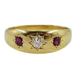 Early 20th century 18ct gold three stone garnet/ruby and diamond gypsy set ring