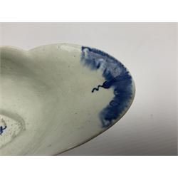 Large 18th century Lowestoft sauce boat, circa 1770, the body decorated with Hughes type floral moulding, and painted in underglaze blue with an Oriental landscape, and foliate sprigs, L23cm