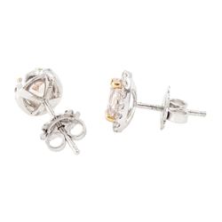 Pair of 18ct white and rose gold morganite and diamond earrings, each stud set with a single oval cut morganite, surrounded by round brilliant cut diamonds, hallmarked, total morganite weight approx 1.40 carat, total diamond weight 0.37 carat
