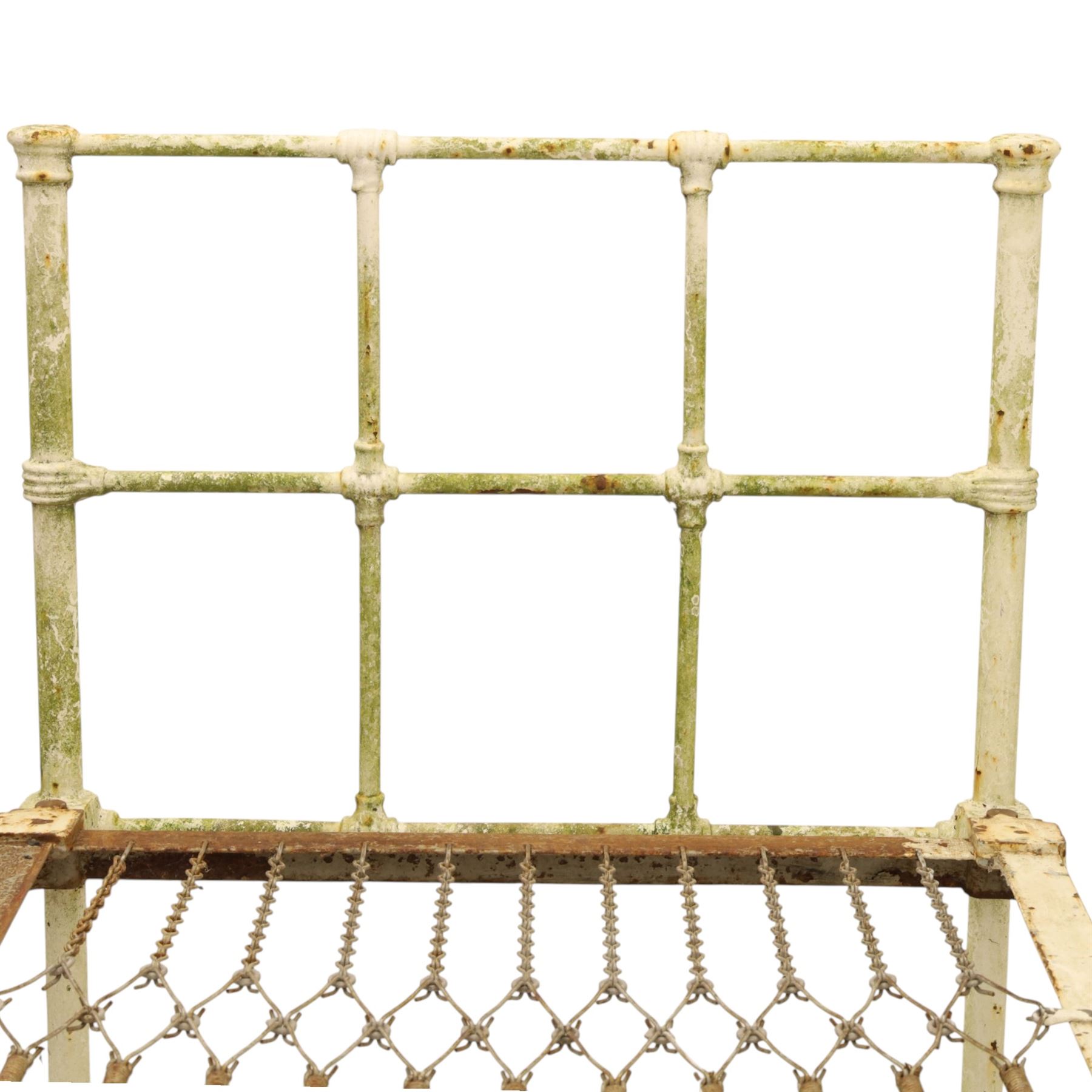19th century wrought iron single bed, white frame with knot details, frame with wire and spring supports