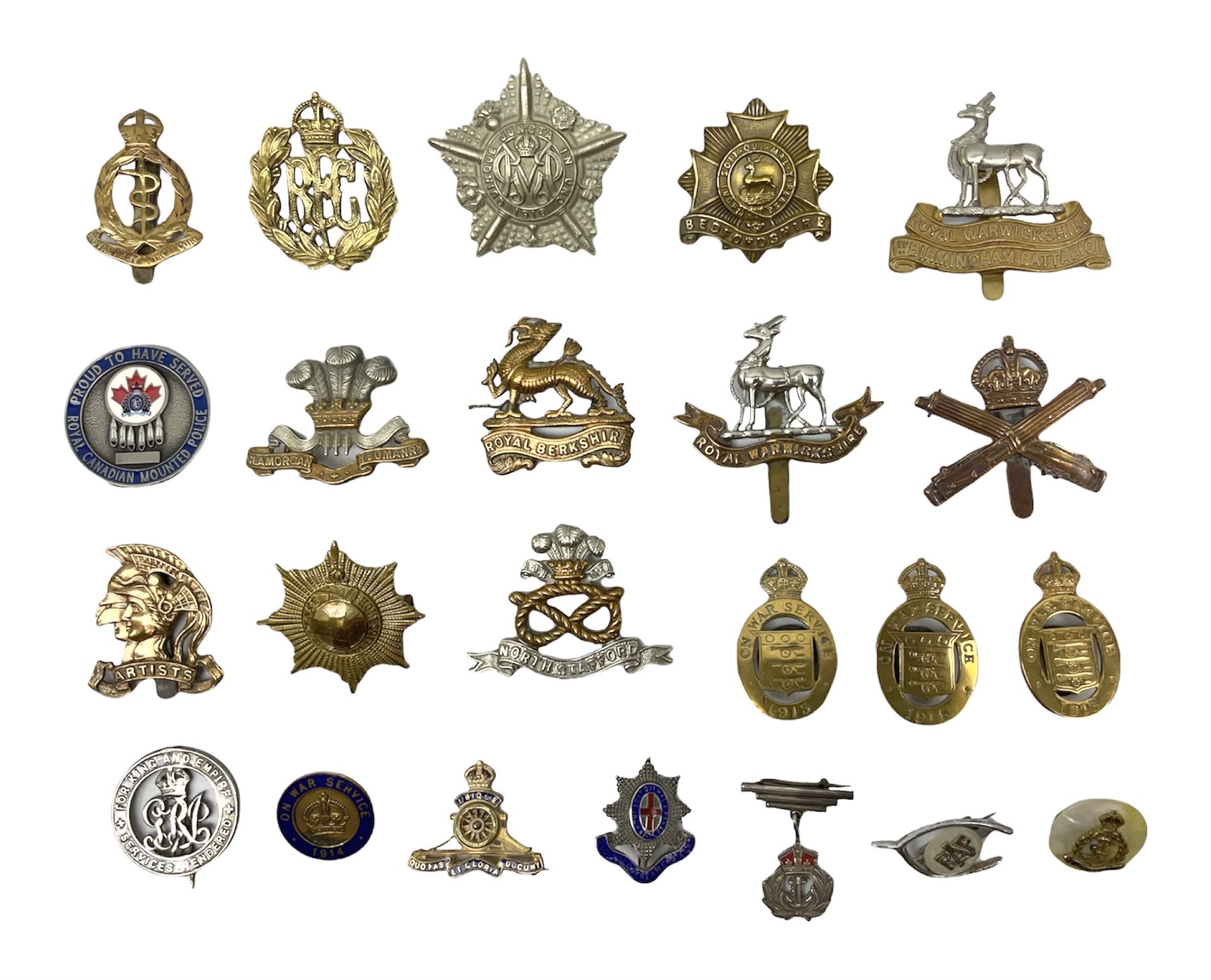 Military metal lapel and pin back badges to include stamped silver Old Coldstreamers Association example and another stamped silver badge, Royal Warwickshire examples, Glamorgan Yeomanry etc