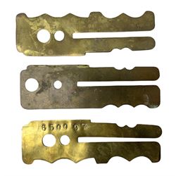 Three war department brass uniform protector button polisher, one marked 650097