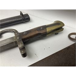 French Model 1874 Epee bayonet marked Oulle 1876 in associated scabbard; Model 1866 sabre bayonet in cut-down sword scabbard; and Model 1842/59 sabre bayonet in relic condition (3)