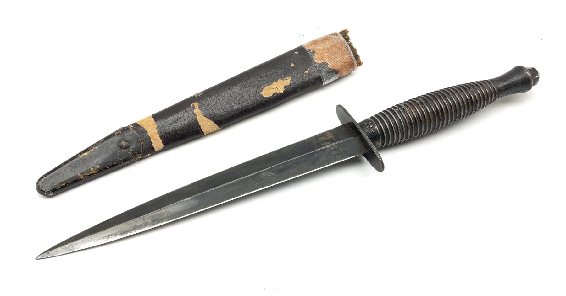 Post WW2 Fairbairn Sykes style black commando knife, no makers name but the handle marked with 'crossed keys *A' L30cm, in part scabbard