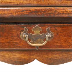 Georgian oak tea table, rectangular fold-over top above single frieze drawer with brass swing handle, shaped apron, gateleg raised on square tapering supports