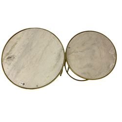 Two contemporary nesting side tables, circular gilt metal frames with white marble tops 