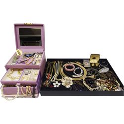 Assorted costume jewellery including matching earrings and necklaces, rings, bracelets, bangles, and beads, with one jewellery box
