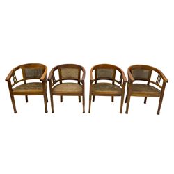 Set of four teak framed tub shaped liner chairs, cane seats and backs