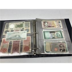 World banknotes, including Queen Elizabeth II The States of Jersey one pound 'DB202703', five pounds 'BB527762' and ten pounds 'AB651481', reserve bank of New Zealand two dollars '1L3 741894', King George V Straits Settlements one dollar 1st January 1935 'F/83 28924', various Bank of England notes etc, housed in two ring binder albums