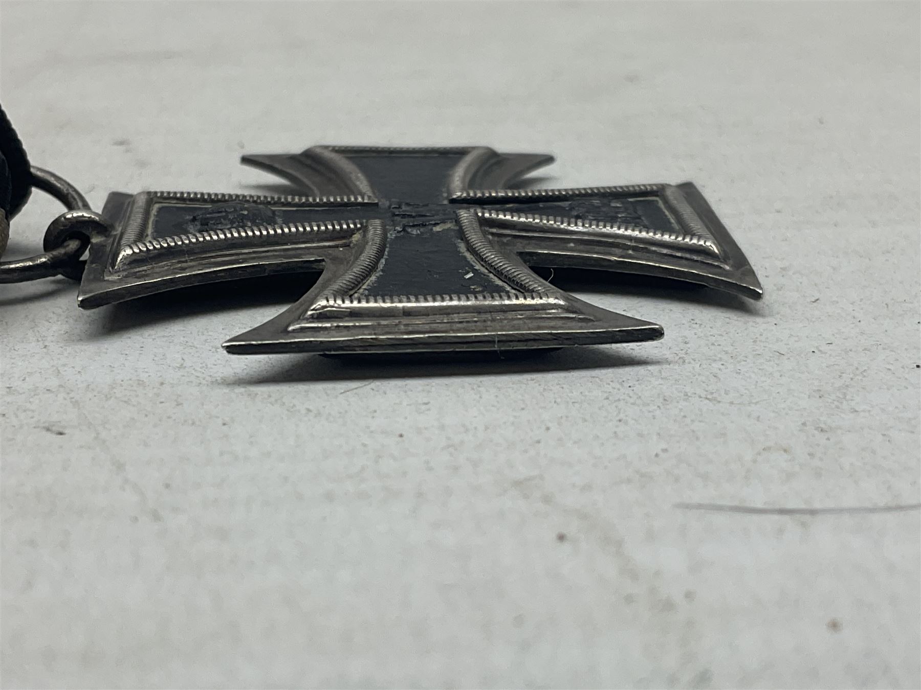 WW1 German Iron Cross 2nd Class with ribbon; ring indistinctly stamped