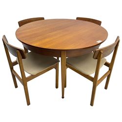 G-Plan - mid-20th century teak extending circular dining table, with concealed additional leaf (W114cm, H72cm); and a set of four mid-20th century teak dining chairs, seat upholstered in beige fabric