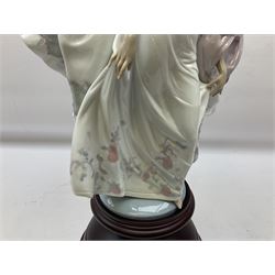 Large Lladro figure, Allegory of Liberty, modelled as two ladies dancing on a mahogany base, with original box, no 5819, year issued 1991, H63cm 