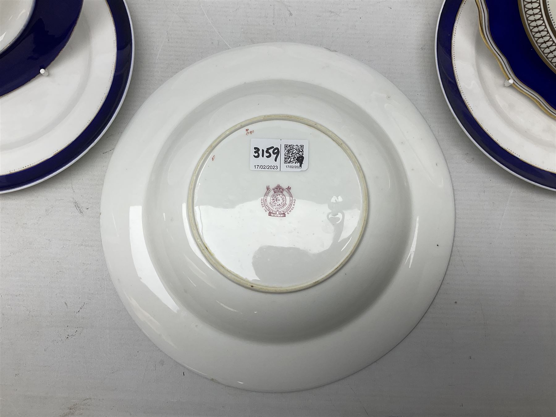 Collection of Regimental dinner wares, Comprising Royal Sussex; two dinner plates, two side plates and a soup bowl, Royal Leicestershire; two dinner plates, East Yorkshire Regiment side plate and Gordon Highlanders side plate, all decorated with the regiment's crests and blue and gilt boarders (9)