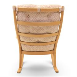 Parker Knoll -model '480' rocking beechwood chair, loose seat cushions above an elasticated webbing seat, curved rocker base 