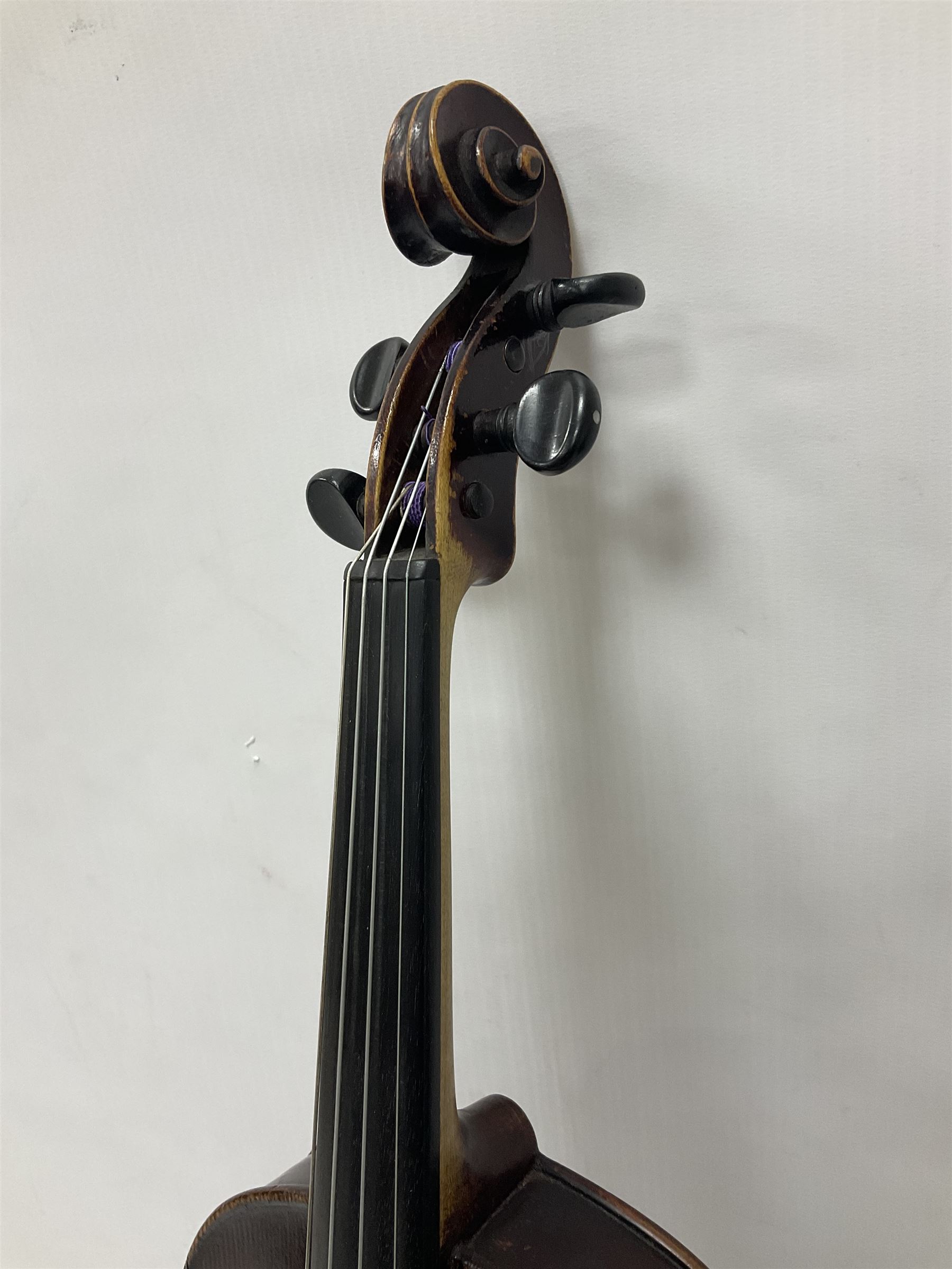 Neuner & Hornstiner early 20th century half size violin c1900, two piece maple back and ribs with a spruce top in a later ridged carrying case, no bow Length 57cm