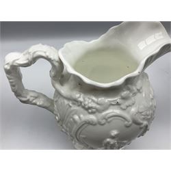 Pair of early/mid 19th century Copeland and Garrett white glazed pitchers, modelled in the Georgian style and moulded with the figures of Venus the Roman Goddess of Love, and Aurora the Roman Goddess of Dawn, within C scroll borders and foliate surround, the naturalistically modelled handle leading to a fruiting vine beneath the rim, upon a spreading base moulded with seashells, with printed green crowned wreath mark beneath, H20cm