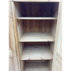 Solid pine triple wardrobe with three drawers