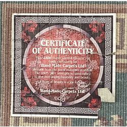 Chinese jade ground woollen rug decorated with dragons 