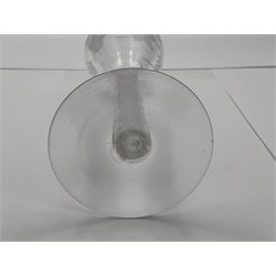 Set of three 18th century style wine glasses, each with funnel bowl etched with fruit vine, upon a double series air twist stem and circular foot, H17cm