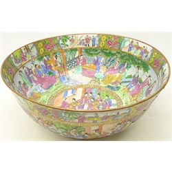  Large 19th century Cantonese Famille Rose punch bowl, the exterior painted with panels of courtiers and figures in gardens and interiors surrounded by greek key gilded borders, the interior similarly painted with a continuous scene with a central circular panel with an figures and attendants, D42cm (a/f)  
