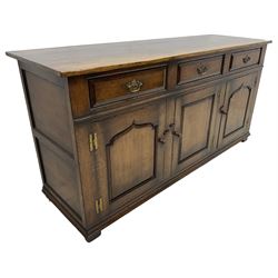 Titchmarsh & Goodwin - traditional oak dresser base, rectangular top over three drawers and three cupboards, enclosed by panelled doors 